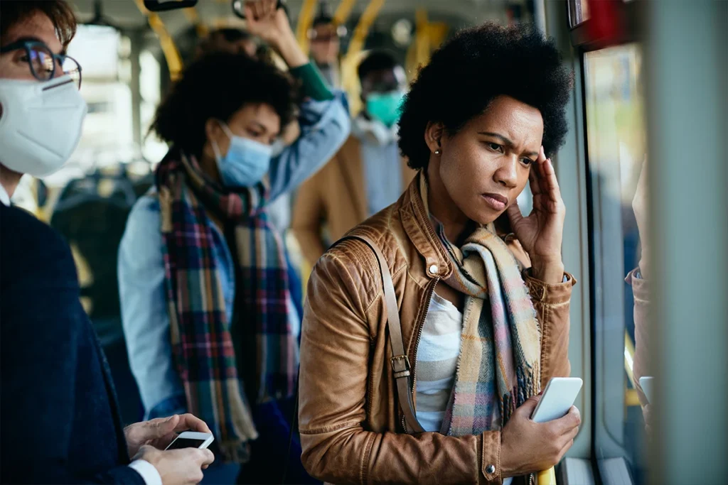 woman in public trying to manage stress